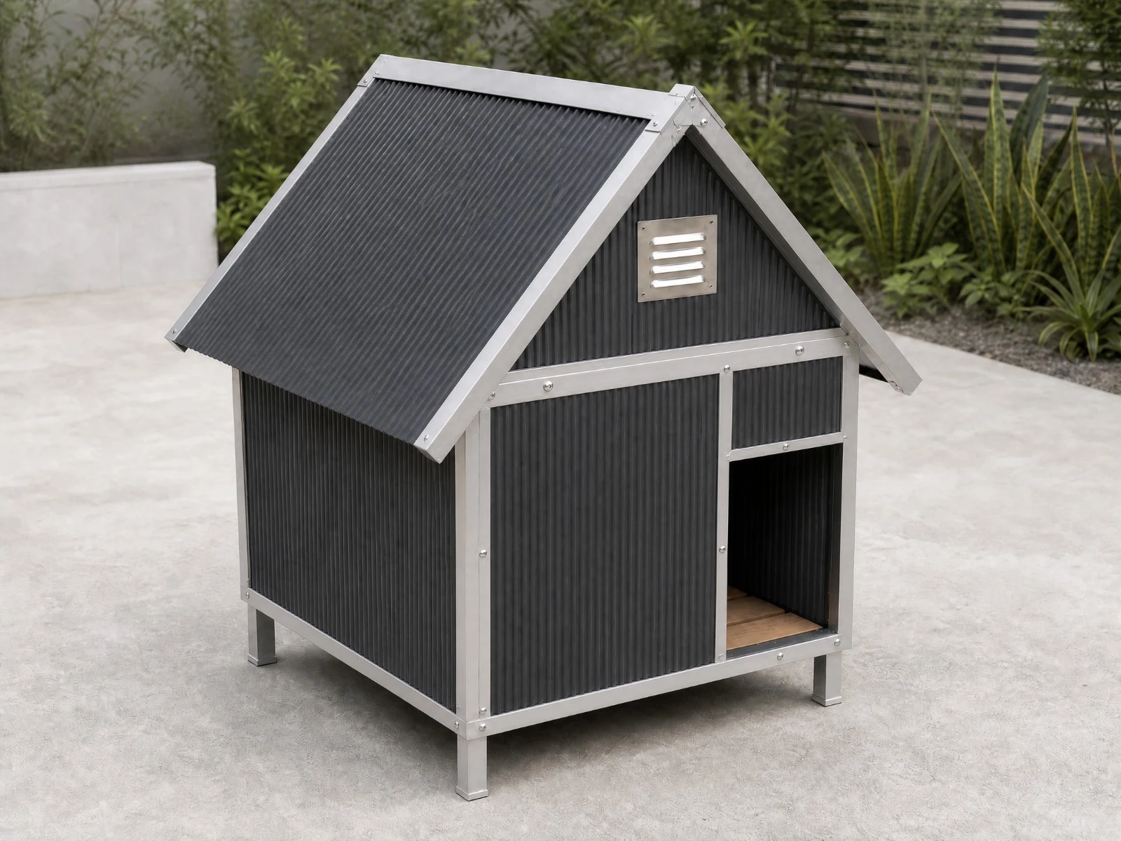 Dark shed-style dog kennel with silver trim and a pitched roof